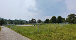 head lake park with fence around playground